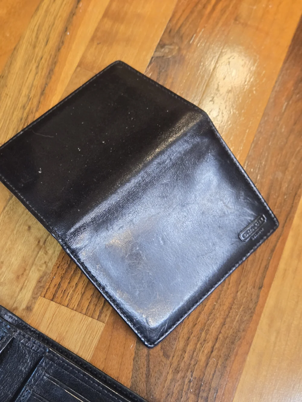 ​Coach Heritage Polished Leather Bifold Wallet – Glossy Black